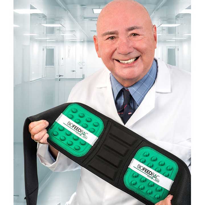 Biofeedbac Lumbros Belt held by inventor Doctor Malcom Pope