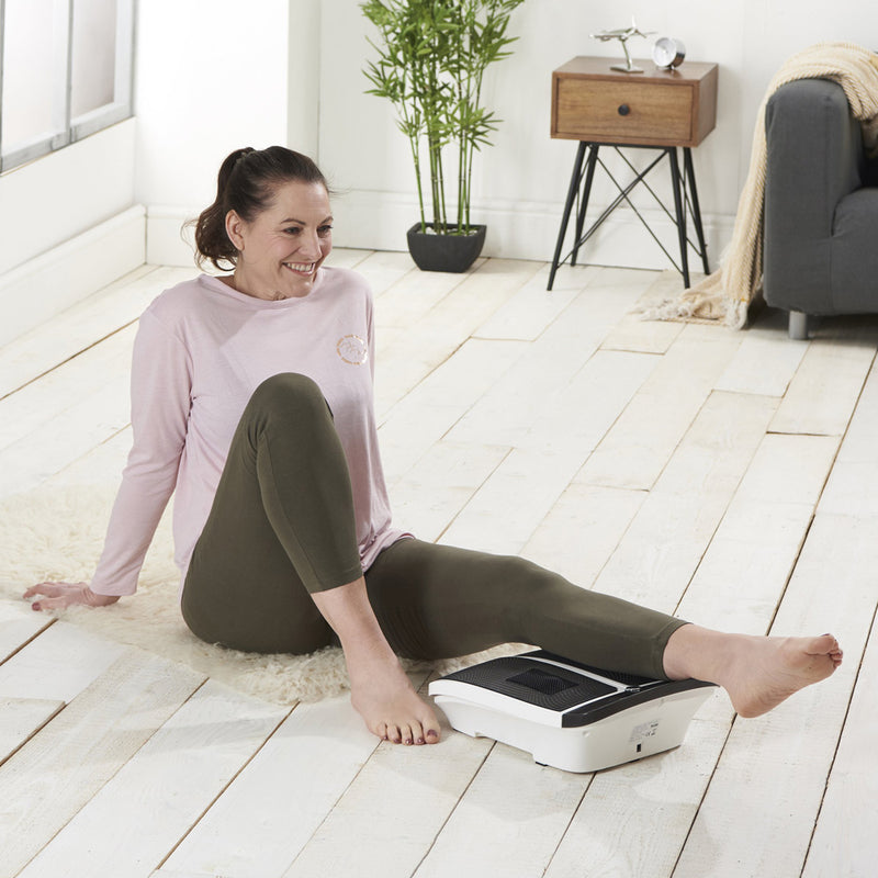Vytaliving Circulation Vibro Care+ Vibration Plate Circulation Machine in use on the legs