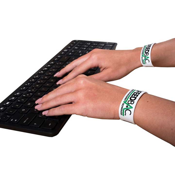 Biofeedbac RSI Wrist Band Typing on Keyboard