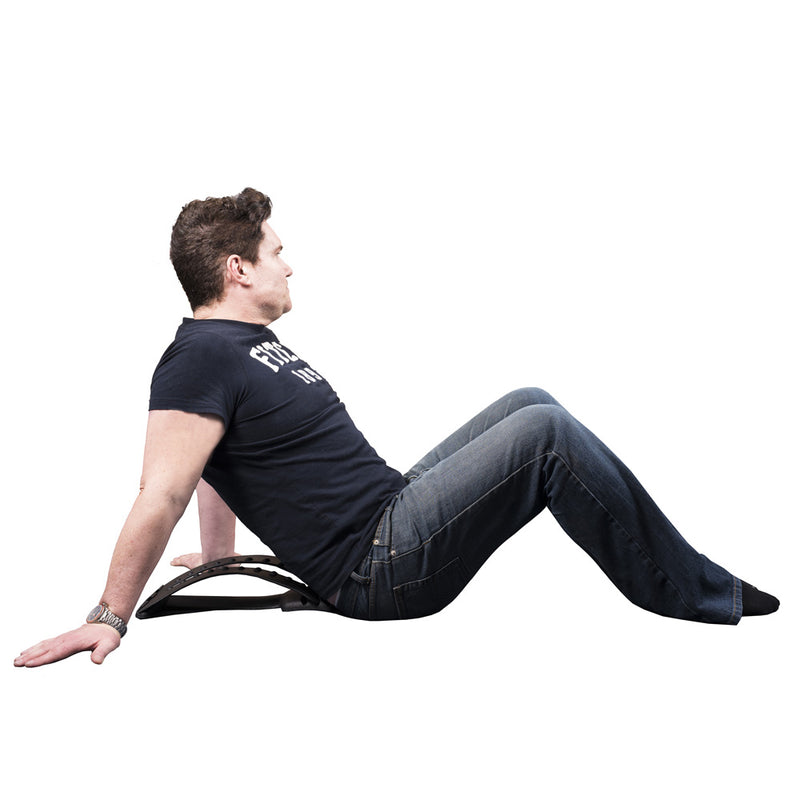 Physiobak Back Stretcher with acupressure massager used by male model